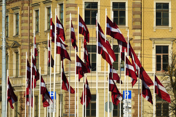 flags of Latvia against the background of the building