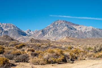 vast desert landscape and Eastern Sierra Nevada mountains, California, USA