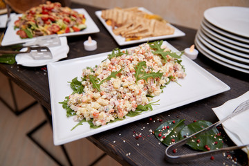 Table with food. Buffet dishes