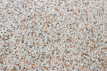 Terrazzo white black red yellow flooring close up