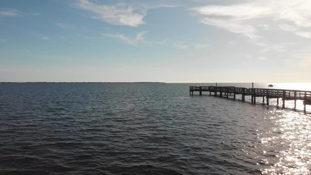 drone fly by the pier