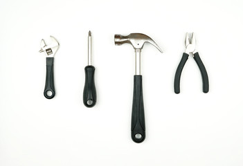 Set of tools for repair and construction : hammer, wrench, pliers and screwdriver