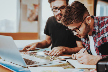 Fototapeta premium Busy Graphic Designers Focus on Project Creating
