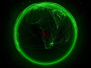 Angola from space on planet Earth with green network representing international communication, technology and travel.