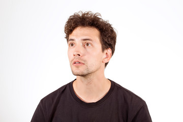 Fototapeta premium Young curious looking guy