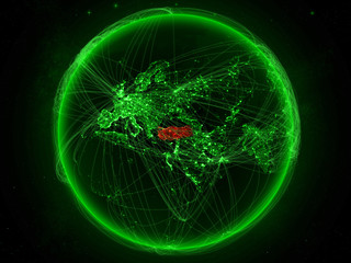 Turkey from space on planet Earth with green network representing international communication, technology and travel.