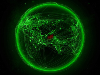 Afghanistan from space on planet Earth with green network representing international communication, technology and travel.