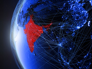 India from space on blue digital model of Earth with international network. Concept of blue digital communication or travel.