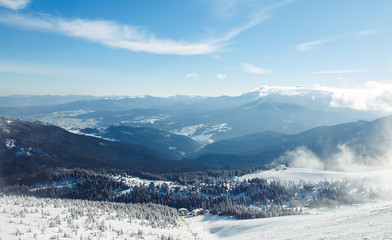 Obraz premium beautiful view of the mountains from a high point. Concept of travel, freedom, beauty of nature. beautiful day, sunny weather, blue sky.