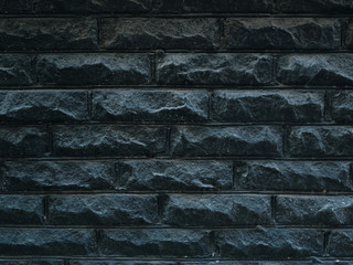 solid black brick wall textured abstract background
