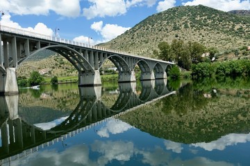 Fototapeta premium Bridge reflections in still river