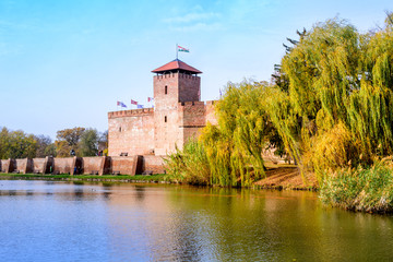 The only remaining brick-built medieval fortress. In front of the castle is a boating lake and a...