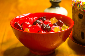translucent multi-colored jelly sweeties in red bowl