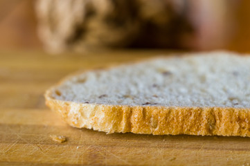 sliced whole wheat breads on a chopping Board