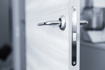 Naklejka premium Closeup on door handle. Nobody