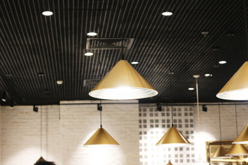 beautiful design interior hanging lamps at cafe