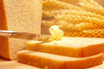 Slices of bread with butter on wheat