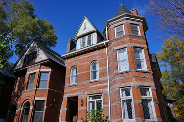 Victorian gothic style brick and stone townhouse architecture