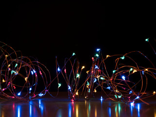 Fairy lights in the black background.