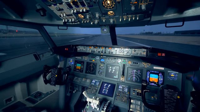 Plane simulator with equipment, close up.