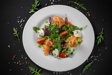 Salad with salmon slices