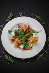 Salad with salmon slices
