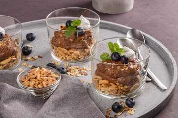 Glass cups of chocolate and chestnuts mousse