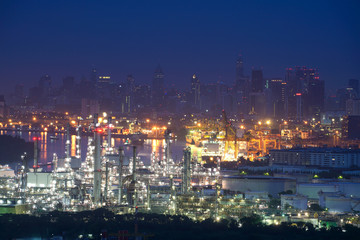 Fototapeta premium Twilight of oil refinery ,Oil refinery and Petrochemical plant at dusk , Bangkok, Thailand