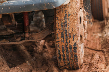 Mud car The tire is full of mud.Truck Tire,Wheels in the countryside are muddy roads.Mud wheel