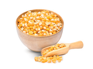 dried corn seeds in wooden scoop and wooden bowl isolated on white background