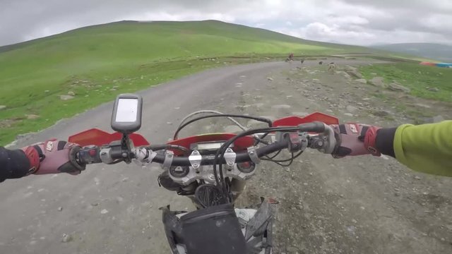 Bike nature Enduro journey with dirt bike high in the Caucasian mountains, hills, valleys