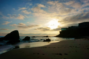 The serene Laguna Beach coastline at sunset.
