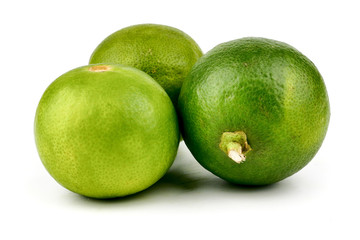 Ripe slice of green lime citrus fruit stand isolated on white background,element of food healthy nutrients and fruit healthy concept