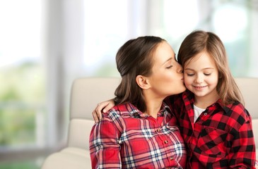 Happy Mother and daughter hugging