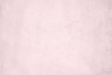 Pink pastel cement texture plastered stucco wall white painted fade background.