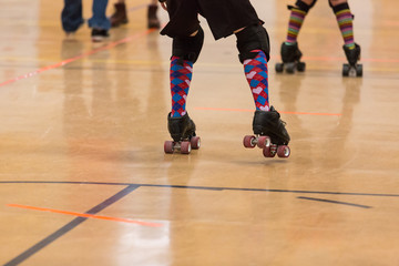 Fototapeta premium Roller derby players compete against each other