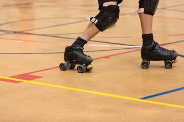 Roller derby players compete against each other