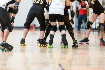 Fototapeta premium Roller derby players compete against each other