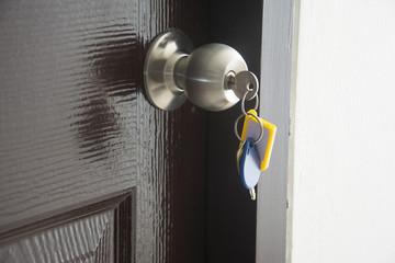 Knob locks with keys on the wood door