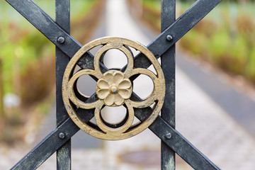 ornament at a wrought iron gate