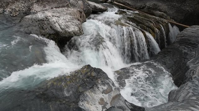 Natural Bridge and sinkhole rock formation over Kicking Horse River in Yoho National Park, British Columbia, Canada