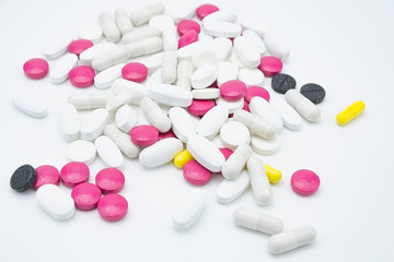 A bunch of colored tablets allopathic and Ayurvedic.Medical topic
