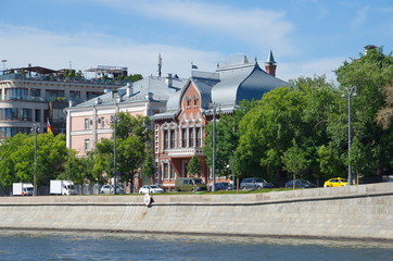 Summer view on Prechistenskaya embankment and the former mansion of I. E. Tsvetkov, Moscow, Russia