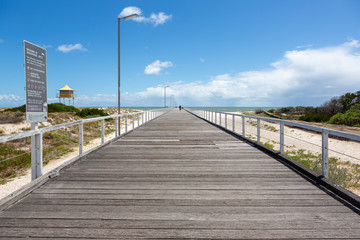 The Semaphore jetty with blue skies and fluffy clouds at Semaphore South Australia on 7th November...