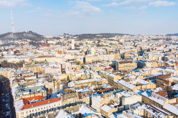 bird's eye view of old european city in winter day on sunset