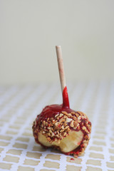 Candy apple missing a bite