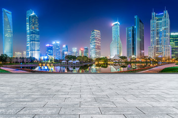 Blue sky, empty marble floor and skyline of Shanghai urban architecture.