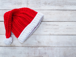  handicraft Santa claus hat on vintage wood