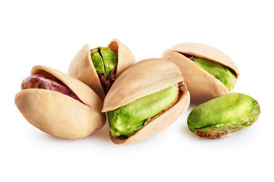 Pistachios isolated on a white background.