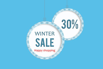 Winter sale 30 % in white blue christmas ball with snowflakes pattern. 